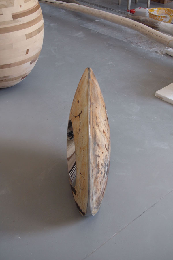 Prasto, Rusted egg form with hole©, 2010; Rusted iron, stainless steel, lead, 70x50x30 cm