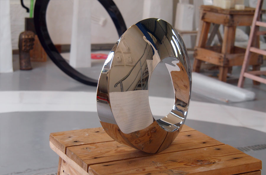 Prasto, Small stainless steel sculpture with a hole©, 2011; Stainless steel, lead, 45x30x10 cm