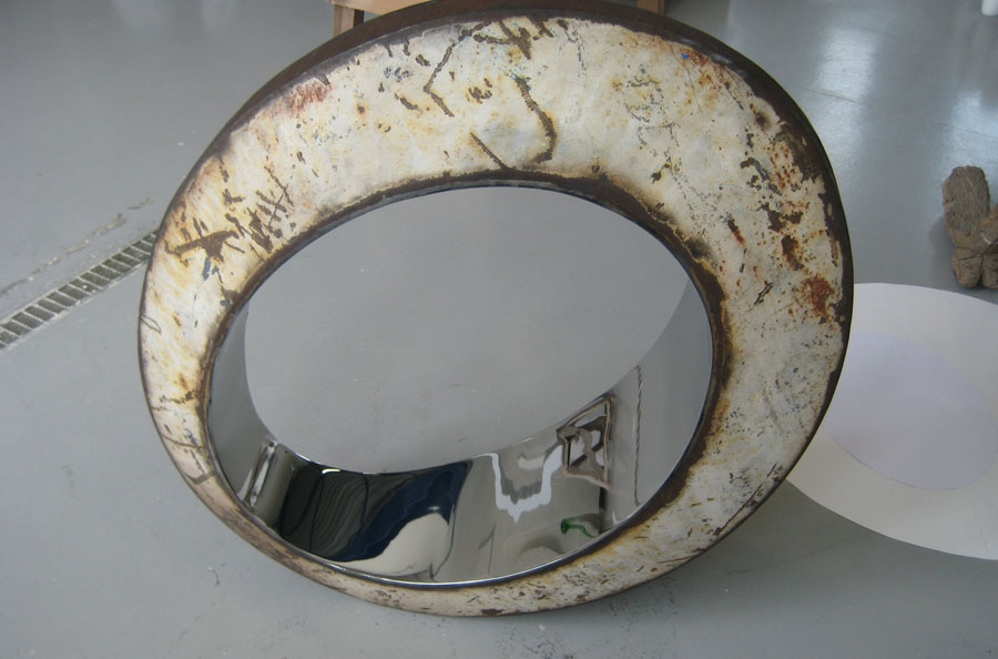 Prasto, White rusted egg form sculpture©, 2010; Rusted iron, stainless steel, lead, 100x80x35 cm