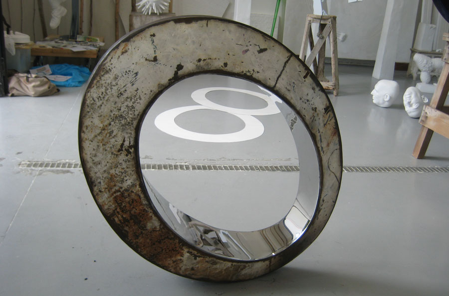 Prasto, White rusted egg form sculpture©, 2010; Rusted iron, stainless steel, lead, 100x80x35 cm